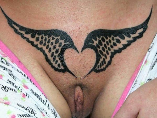 Голые девушки с интимными татуировками в пикантных местах 13 из 30 фото